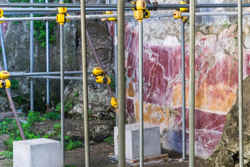 House of Dionysiac Reliefs, Herculaneum. October 2023.
Looking towards east wall in north-east corner of room (m). Photo courtesy of Johannes Eber.
